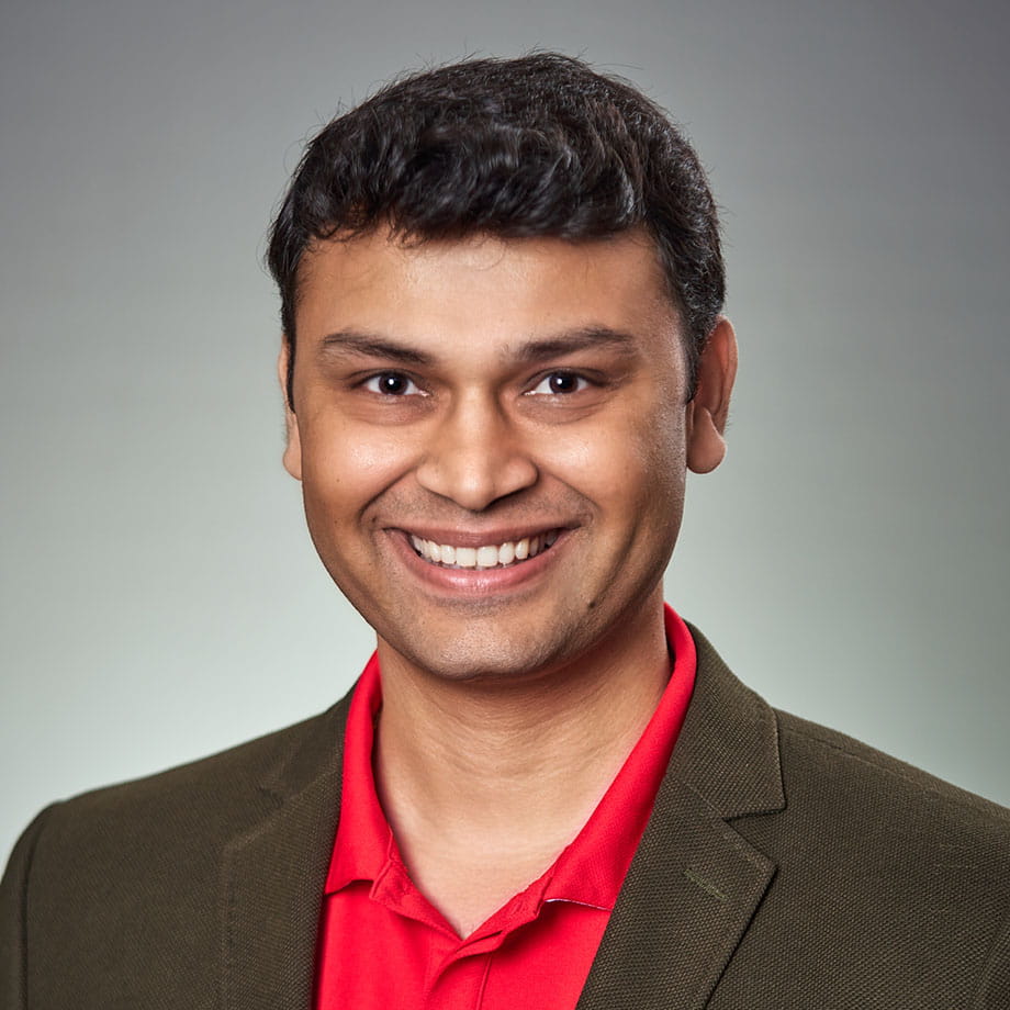 Headshot of Anand Mhatre smiling