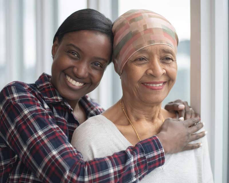 CAREClinicTwoWomenSmiling