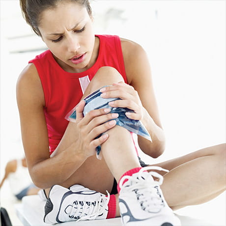 woman with an ice pack on her knee