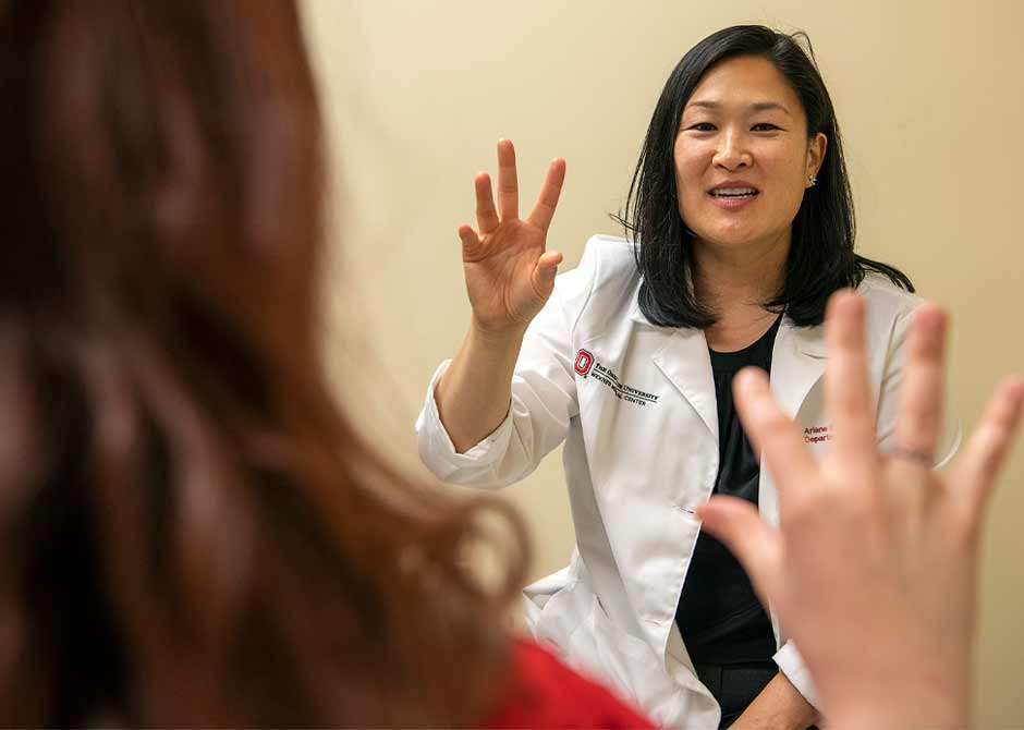 Doctor and patient doing hand motor exercise